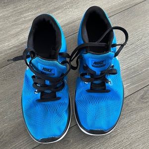 Blue Nike running shoes